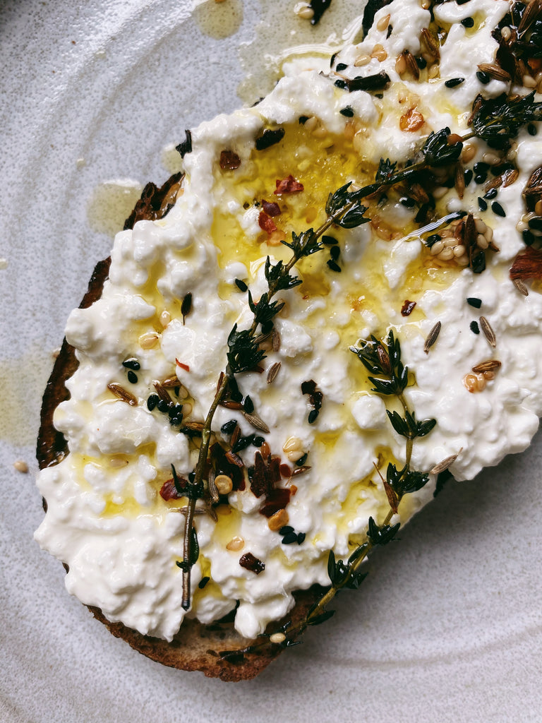 Cottage cheese toast with infused hot olive oil