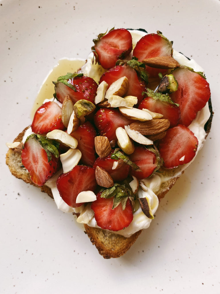 Labneh, strawberries, maple syrup, chopped nuts