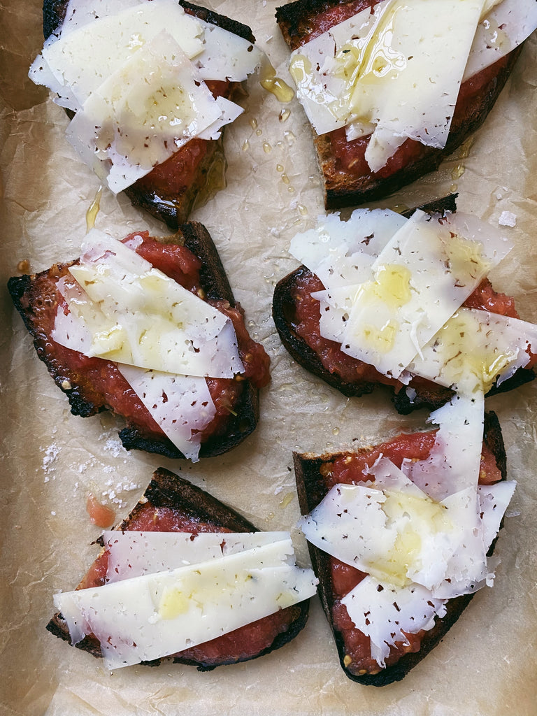 Pan con tomate on rye with manchego shavings