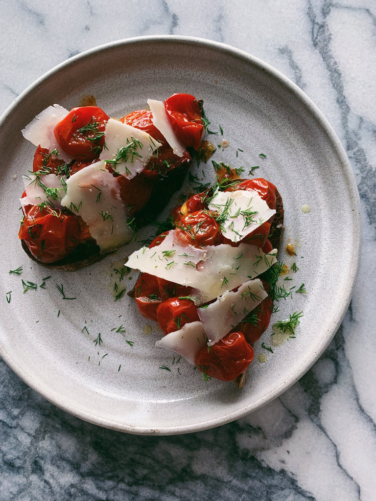 Blistered cherry tomato on toast